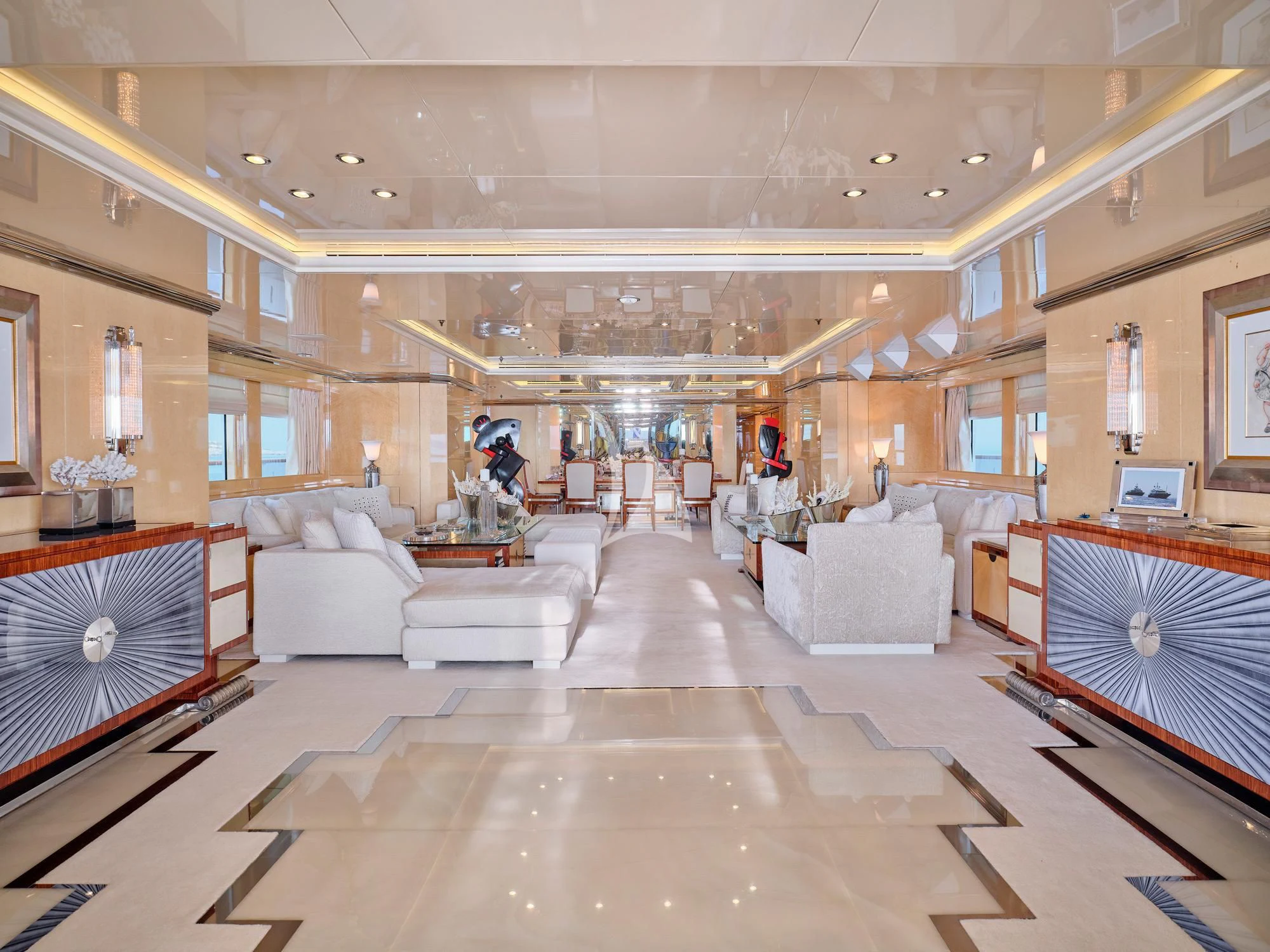 a large room with a large mirror aboard SUNDAY Yacht for Charter