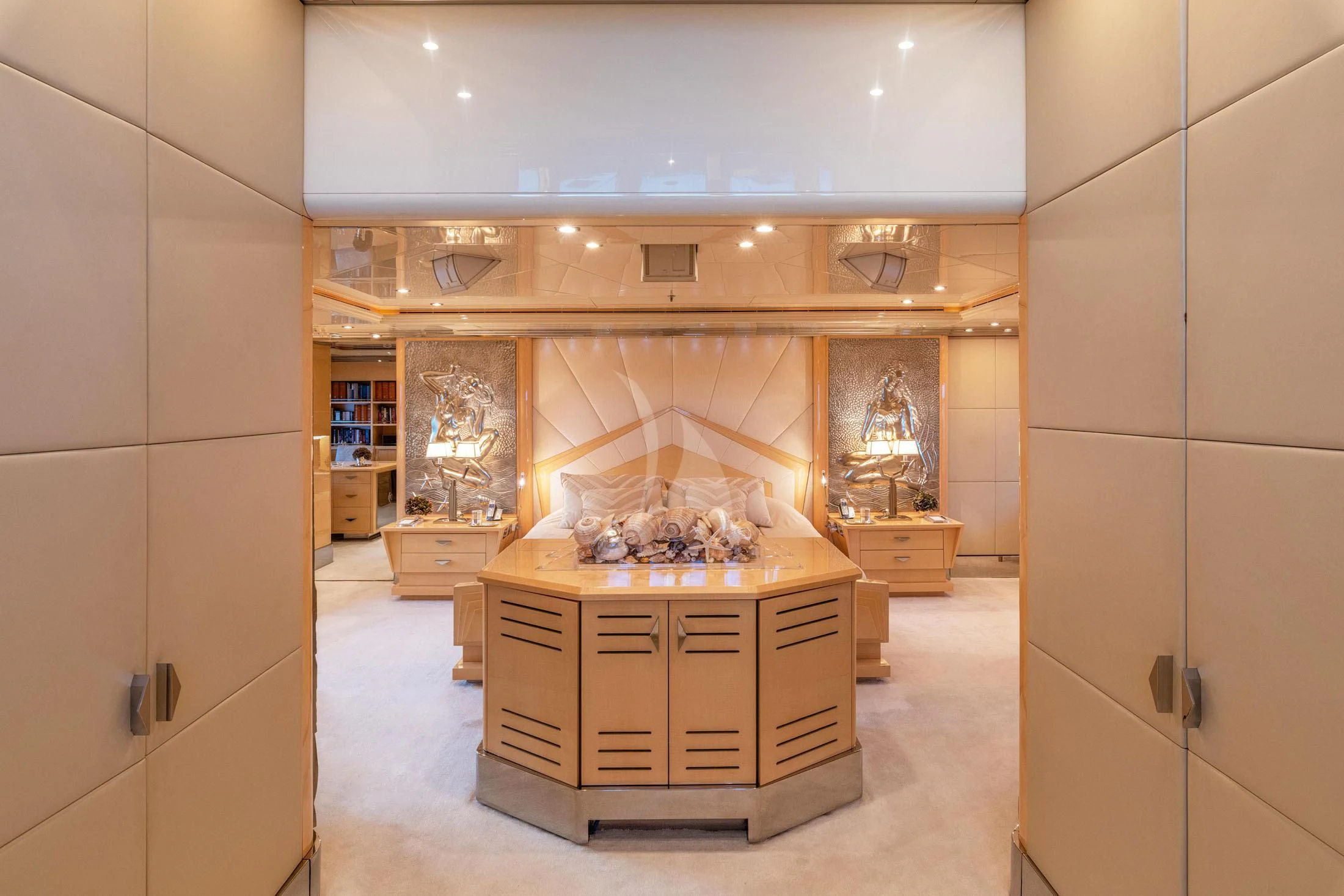 a room with a large display aboard SUNDAY Yacht for Charter