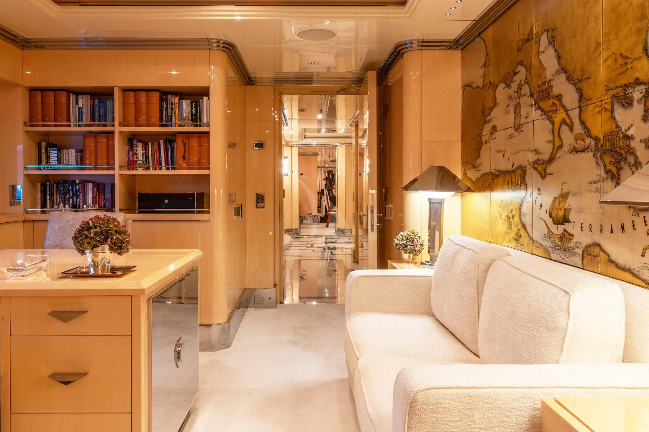 a living room with a couch and a table aboard SUNDAY Yacht for Charter
