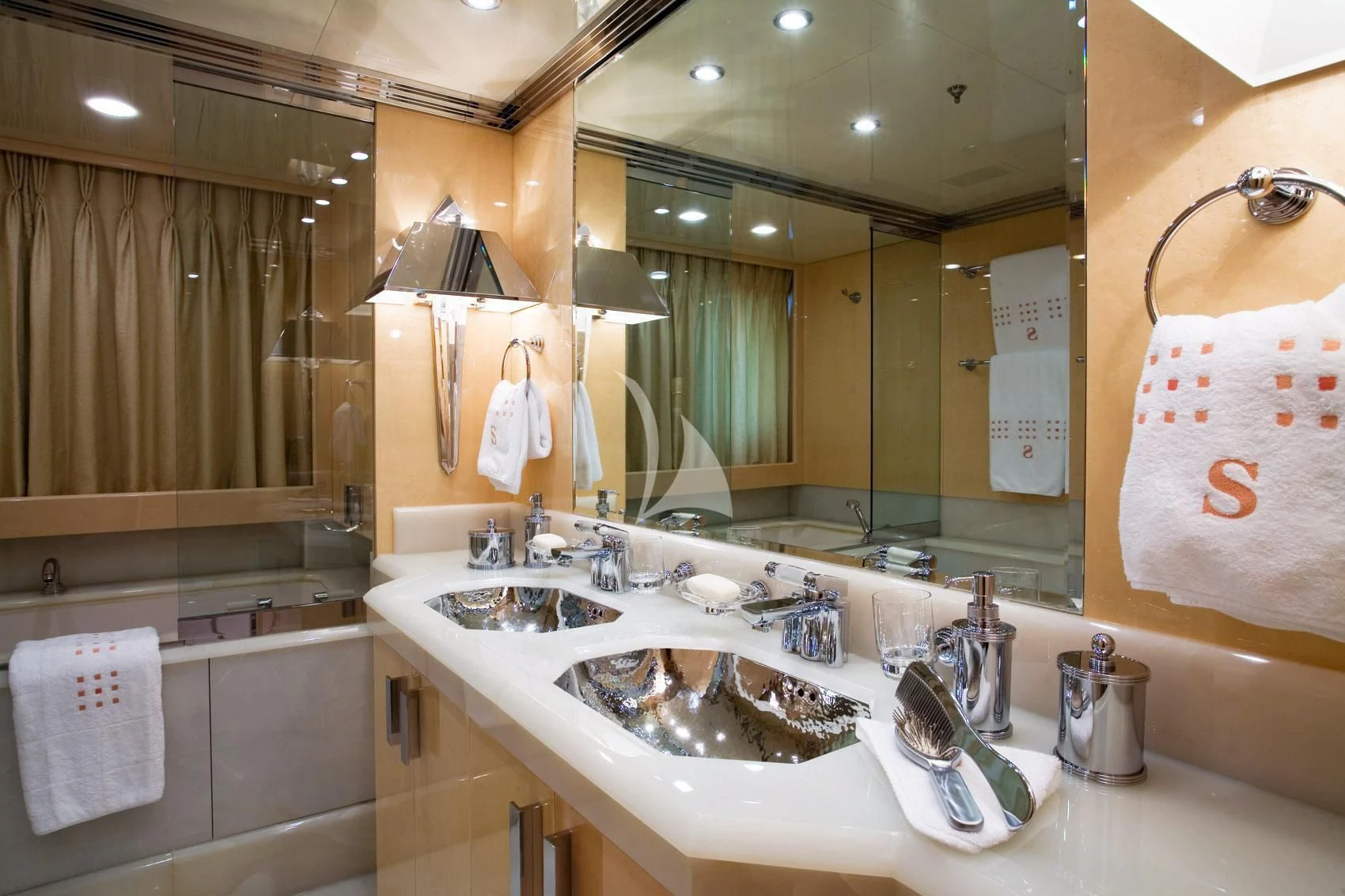 a bathroom with a large mirror aboard SUNDAY Yacht for Charter