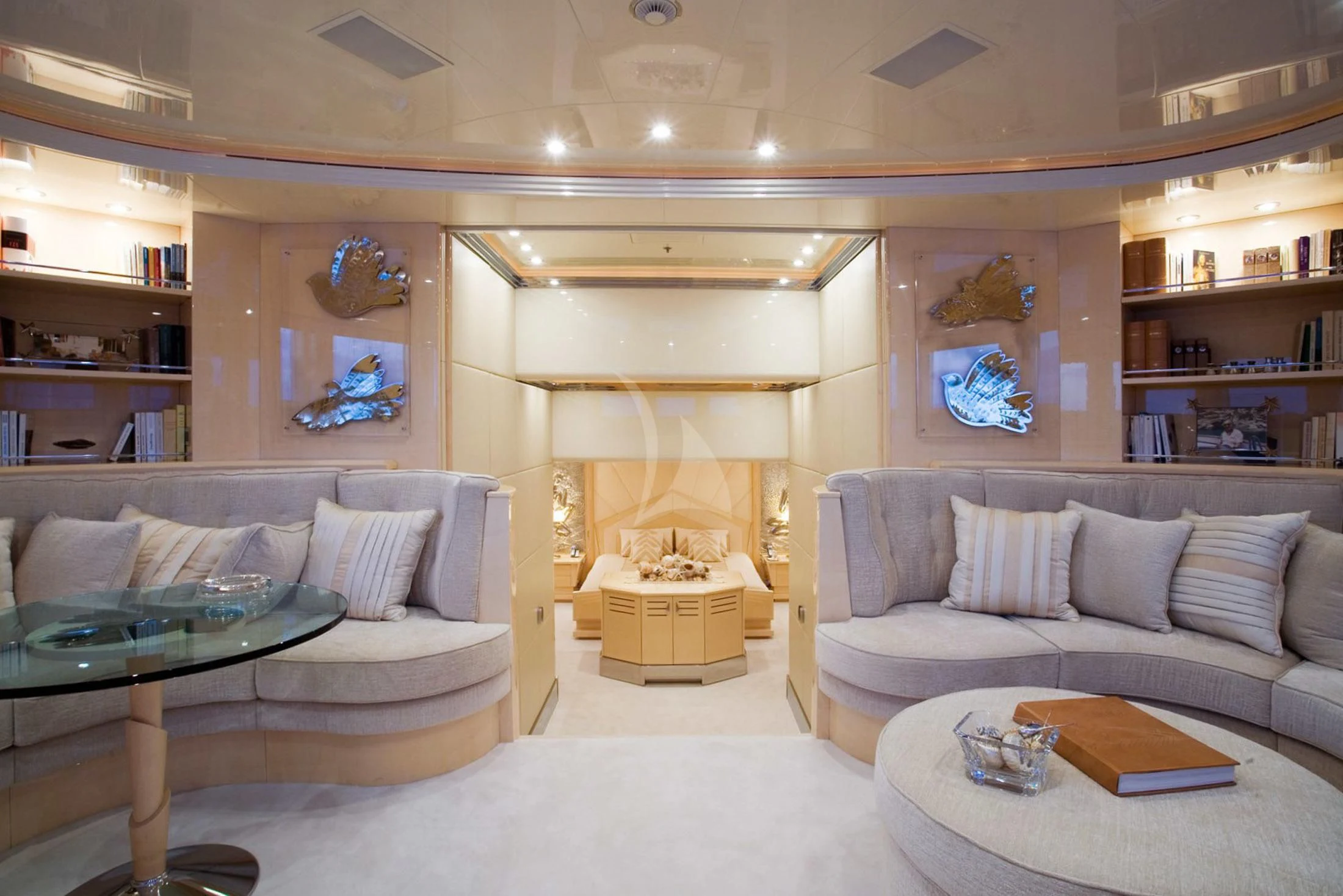 a living room with a large mirror aboard SUNDAY Yacht for Charter