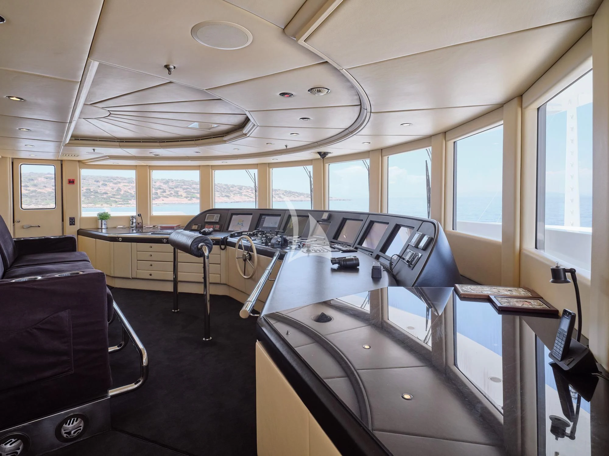 a room with a desk and a chair aboard SUNDAY Yacht for Charter