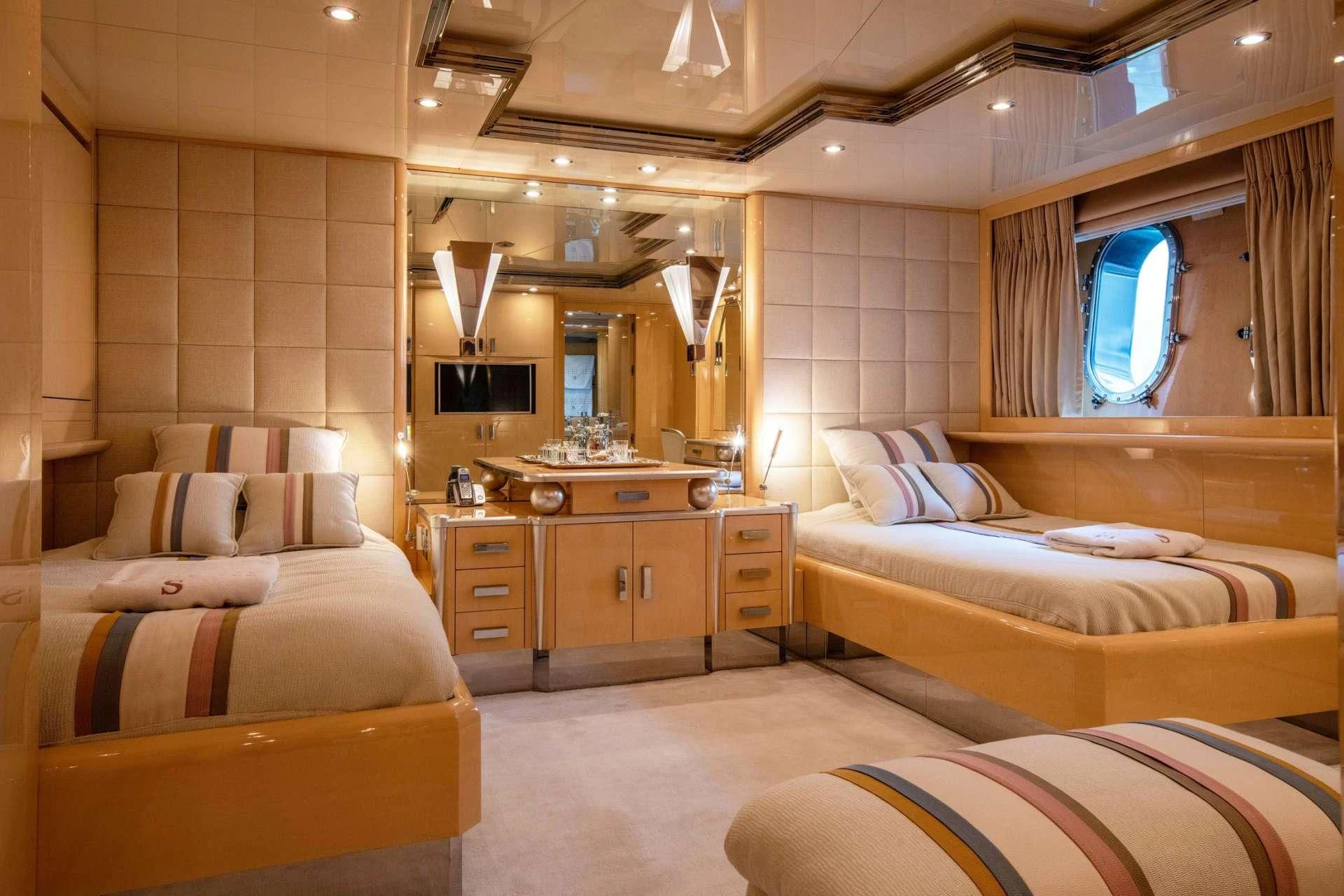 a room with two beds aboard SUNDAY Yacht for Charter