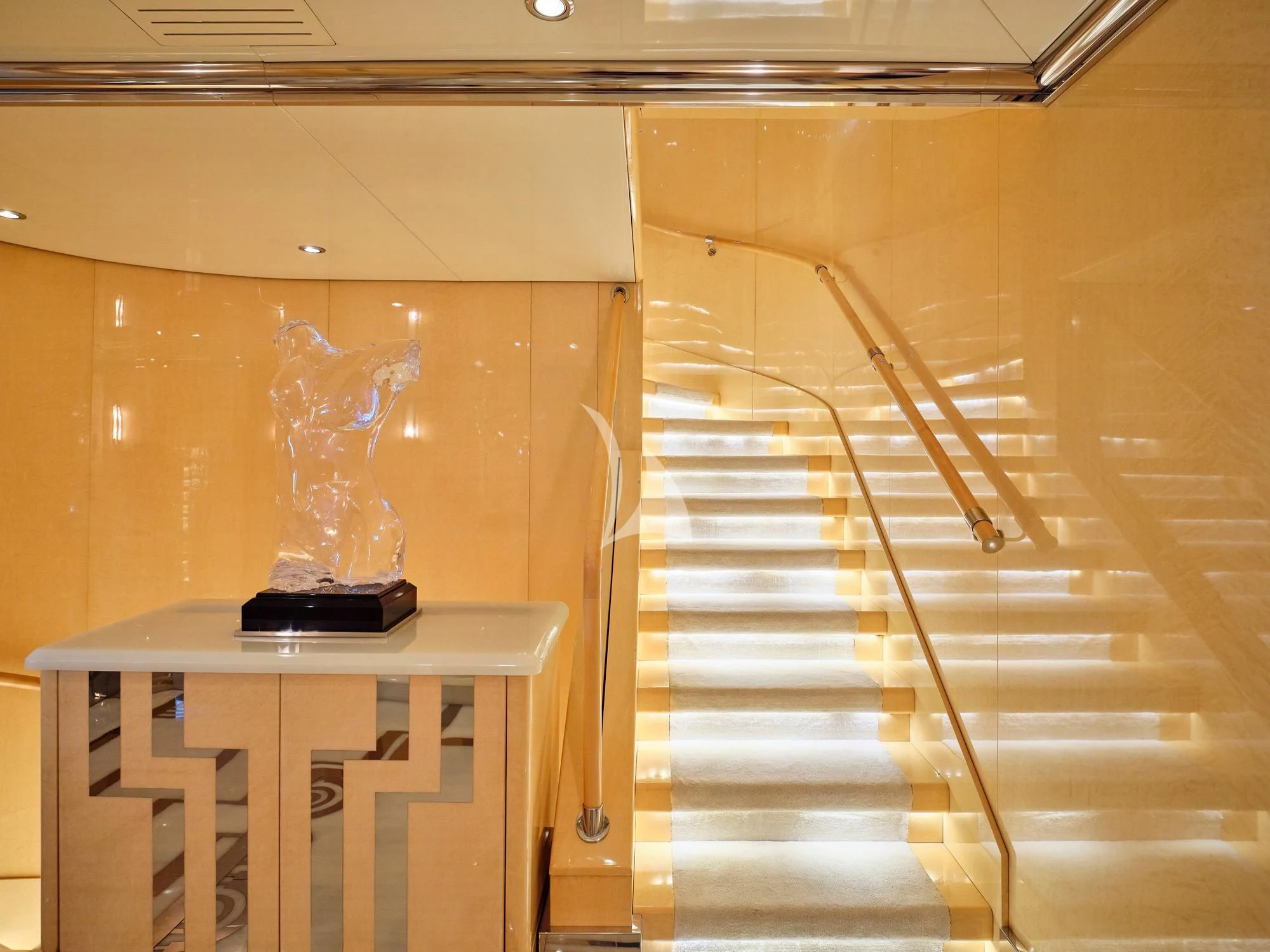 a room with a table and a ladder aboard SUNDAY Yacht for Charter