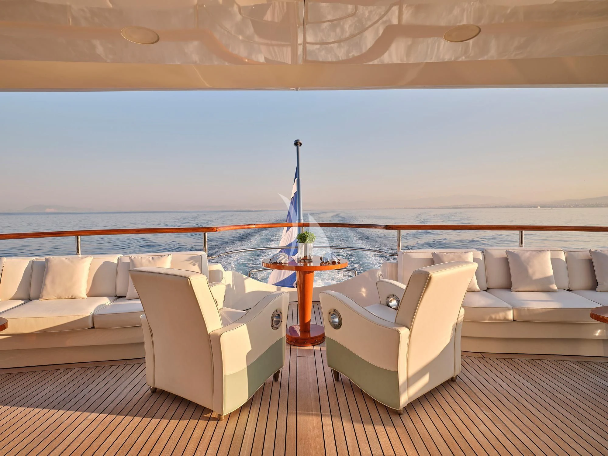 a room with a couch and a table and chairs aboard SUNDAY Yacht for Charter