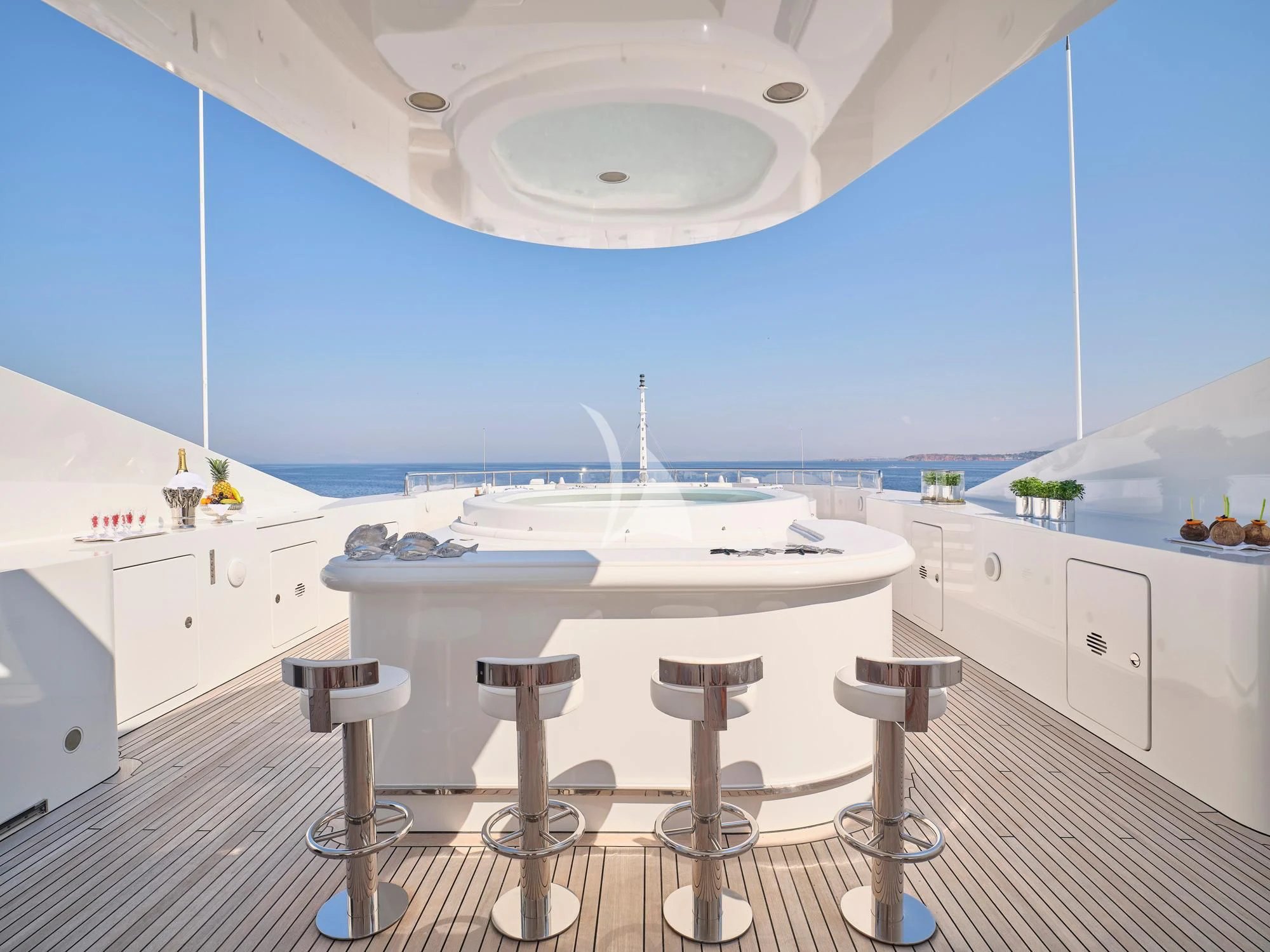 a large white swimming pool aboard SUNDAY Yacht for Charter
