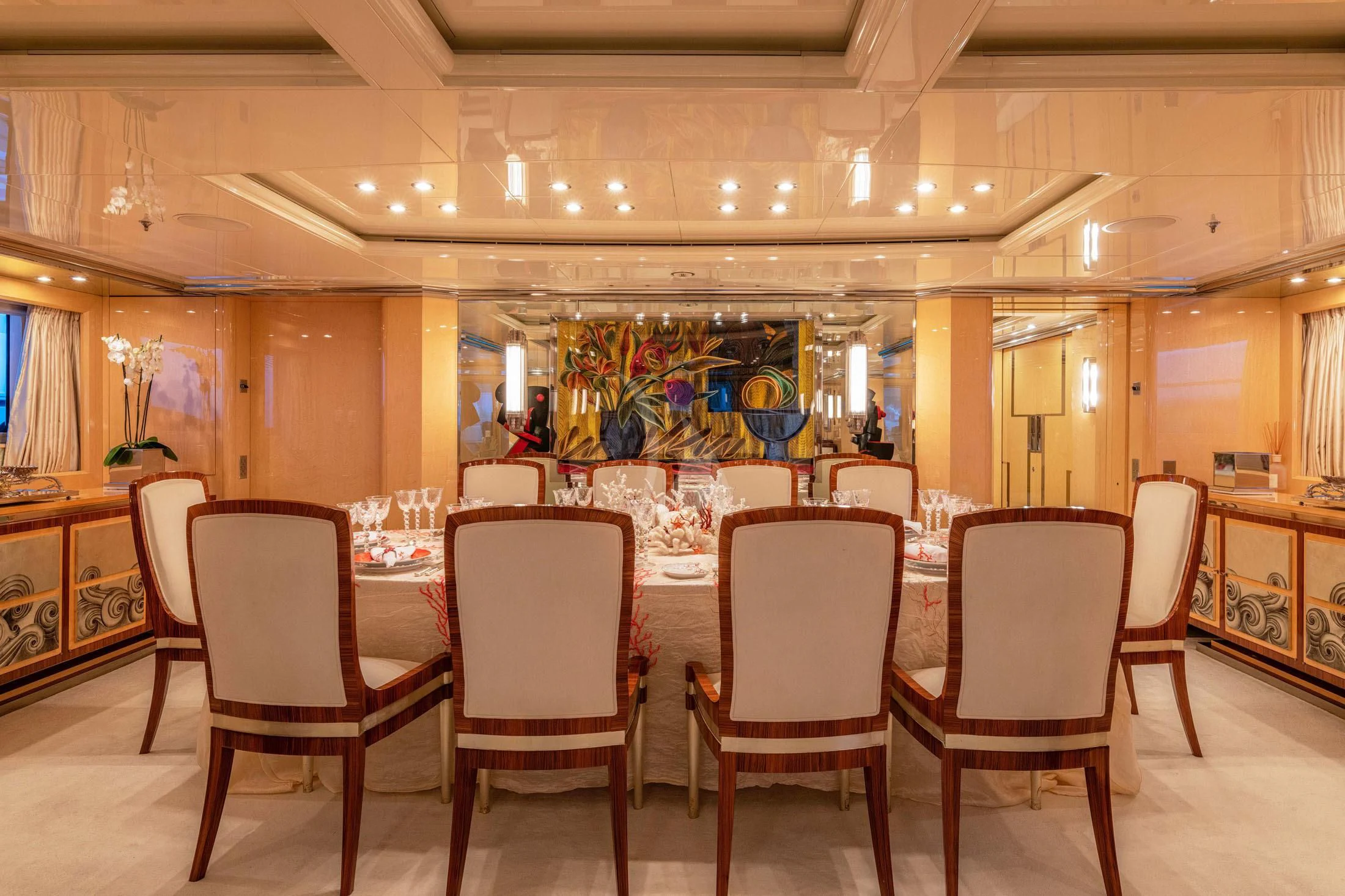 a large room with tables and chairs aboard SUNDAY Yacht for Charter