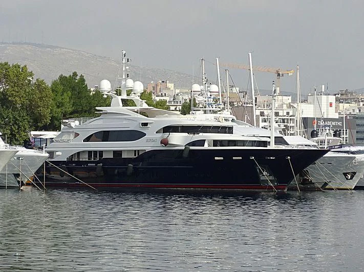 a boat docked at a pier aboard SUNDAY Yacht for Charter