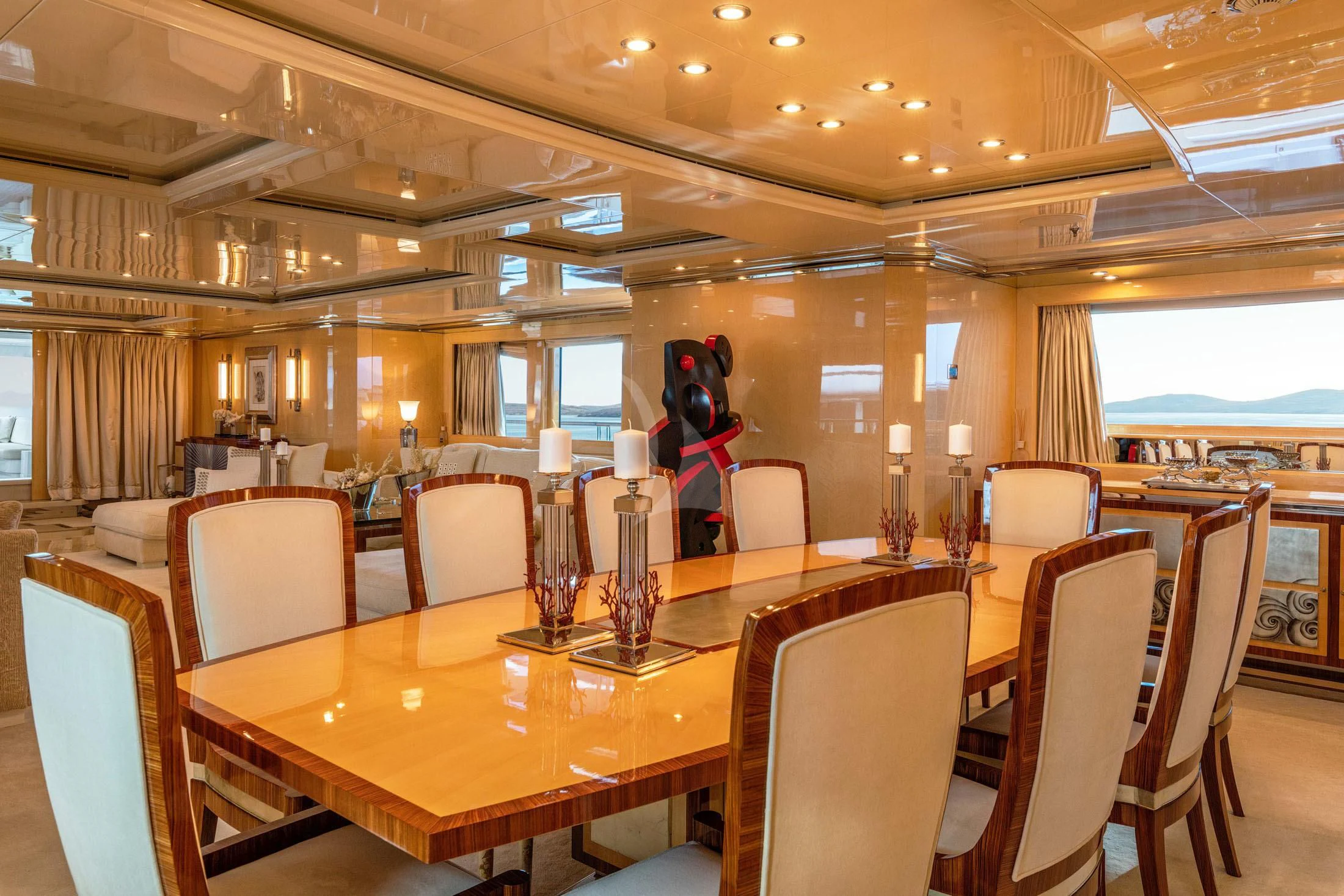 a large room with tables and chairs aboard SUNDAY Yacht for Charter