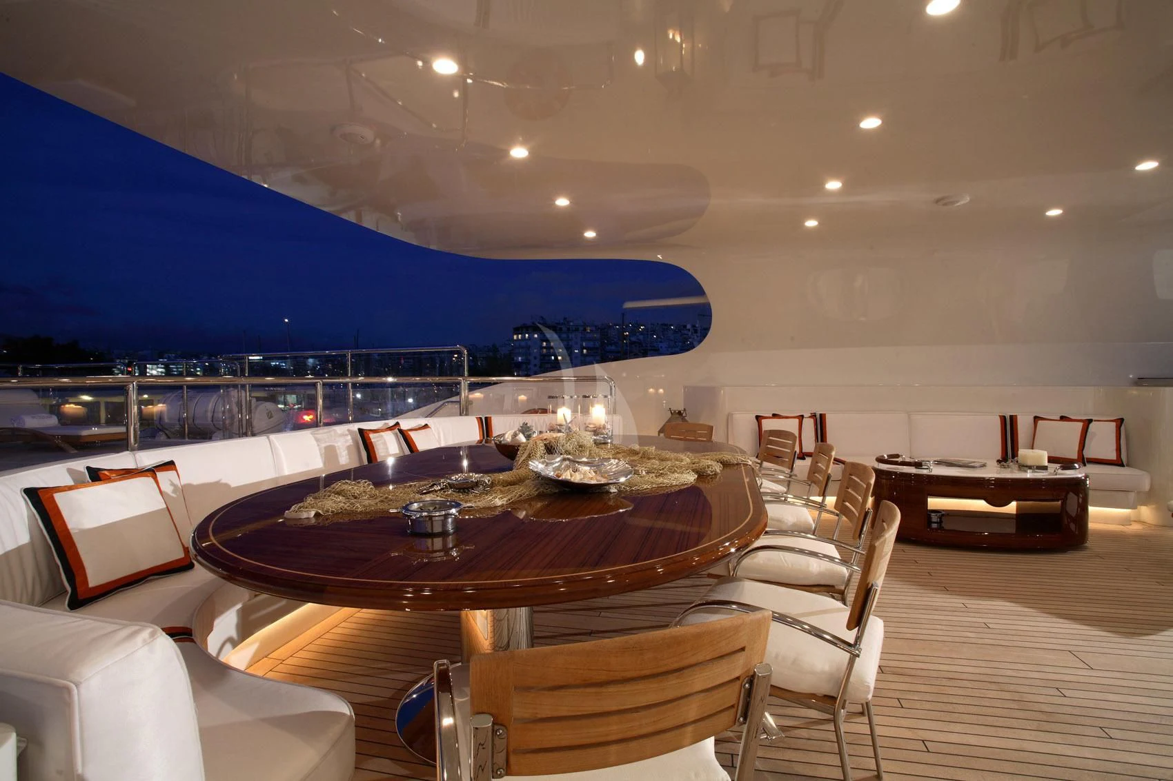 a large room with a table and chairs aboard SUNDAY Yacht for Charter
