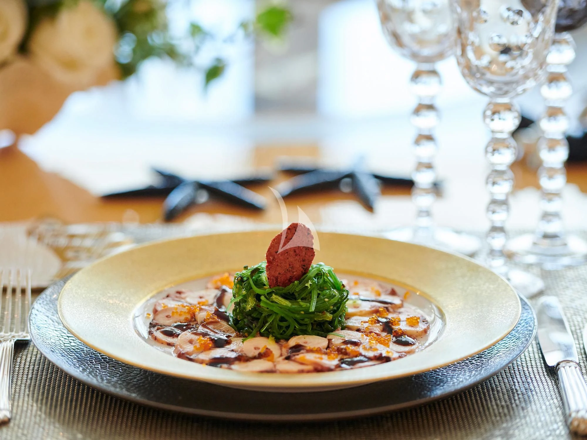 a plate of food aboard SUNDAY Yacht for Charter