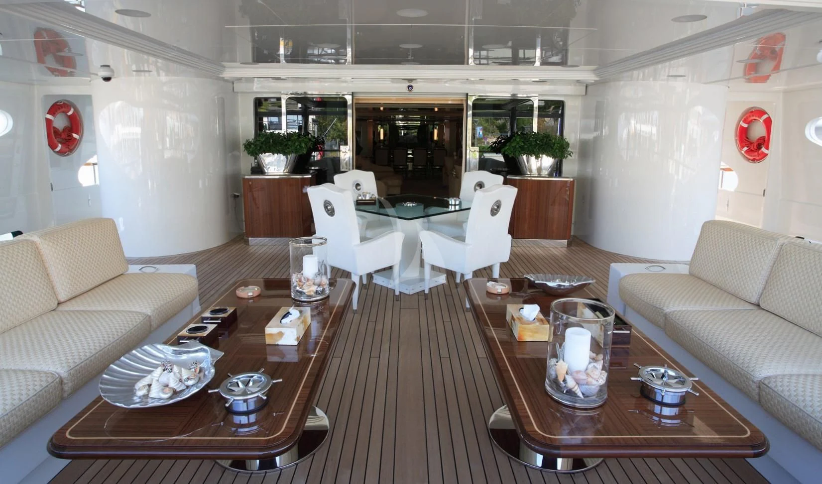 a living room with a table and chairs aboard SUNDAY Yacht for Charter