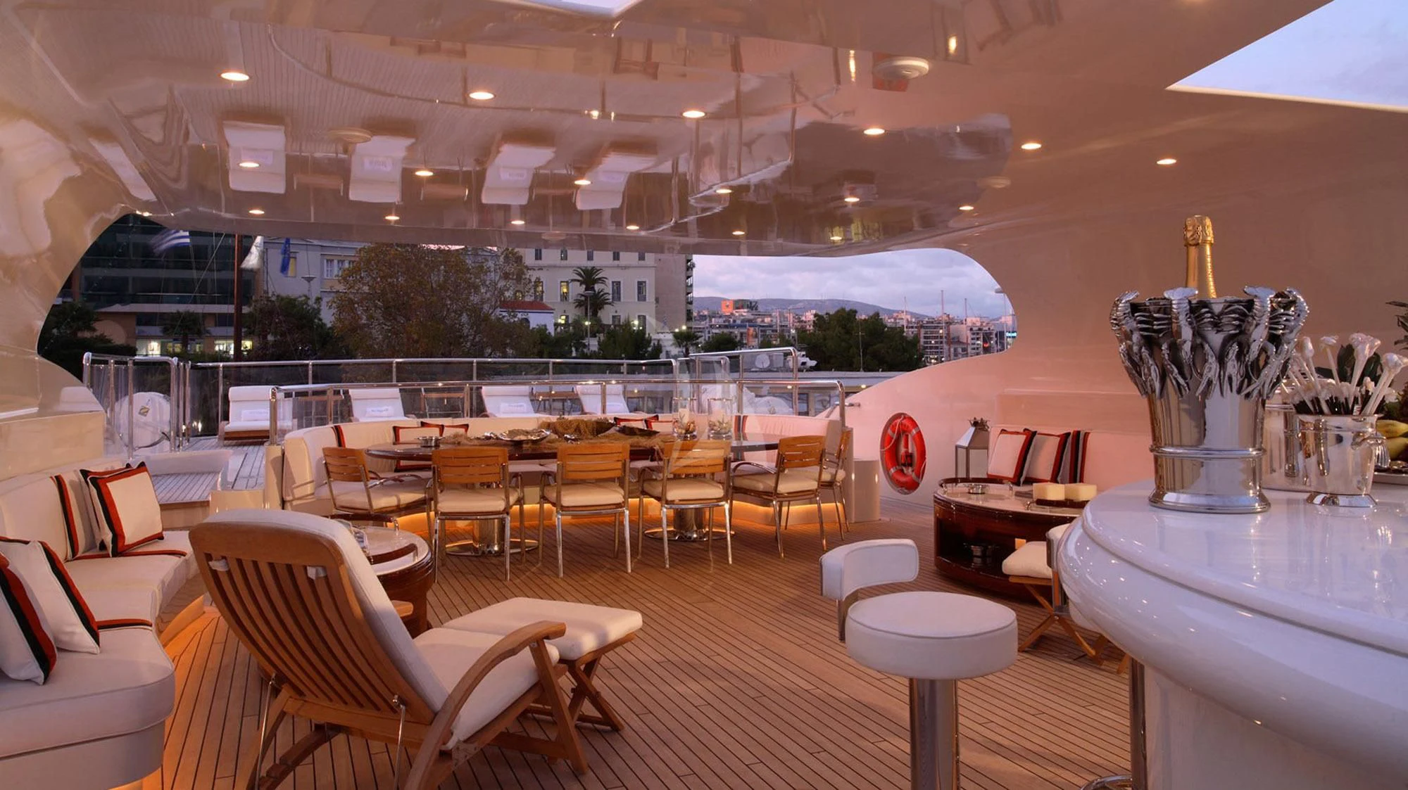 a room with tables and chairs aboard SUNDAY Yacht for Charter
