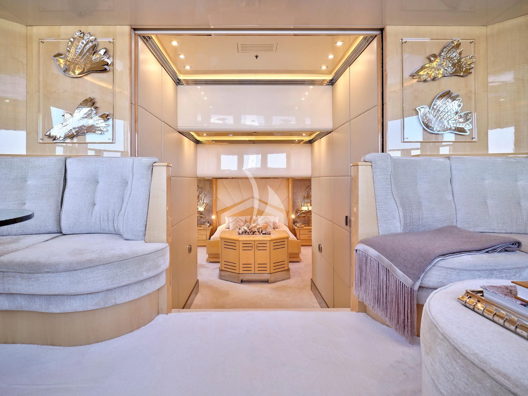 a living room with a fireplace aboard SUNDAY Yacht for Charter