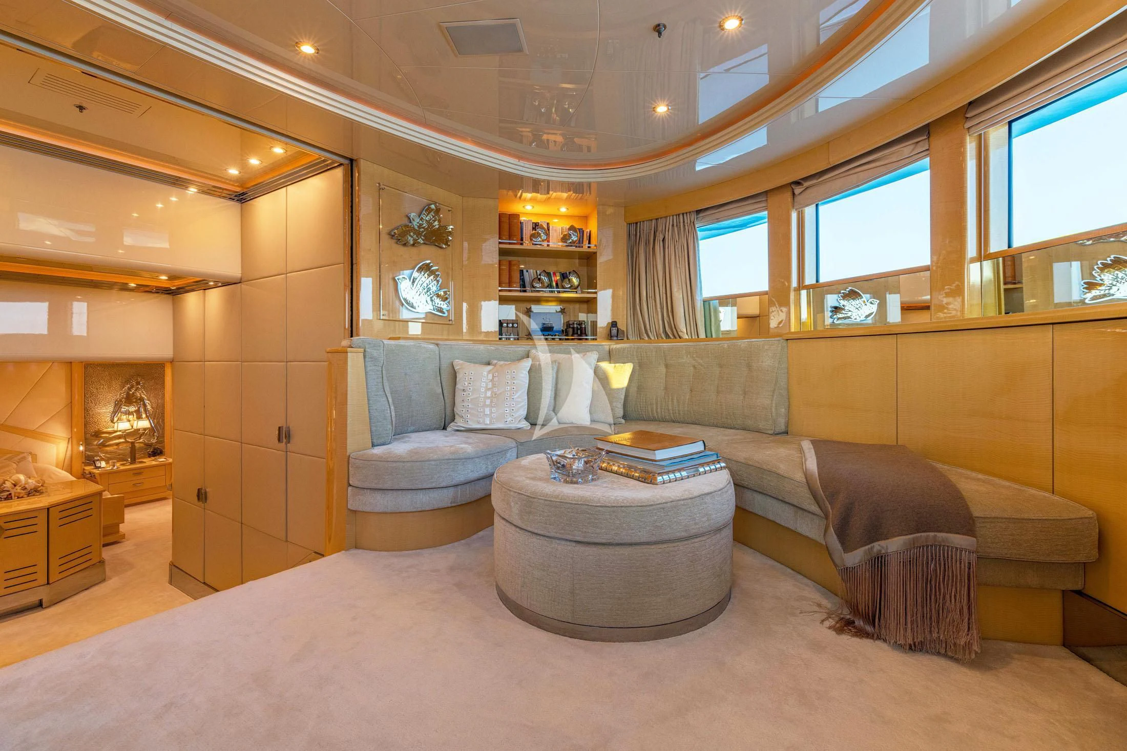 a living room with a couch and a table aboard SUNDAY Yacht for Charter