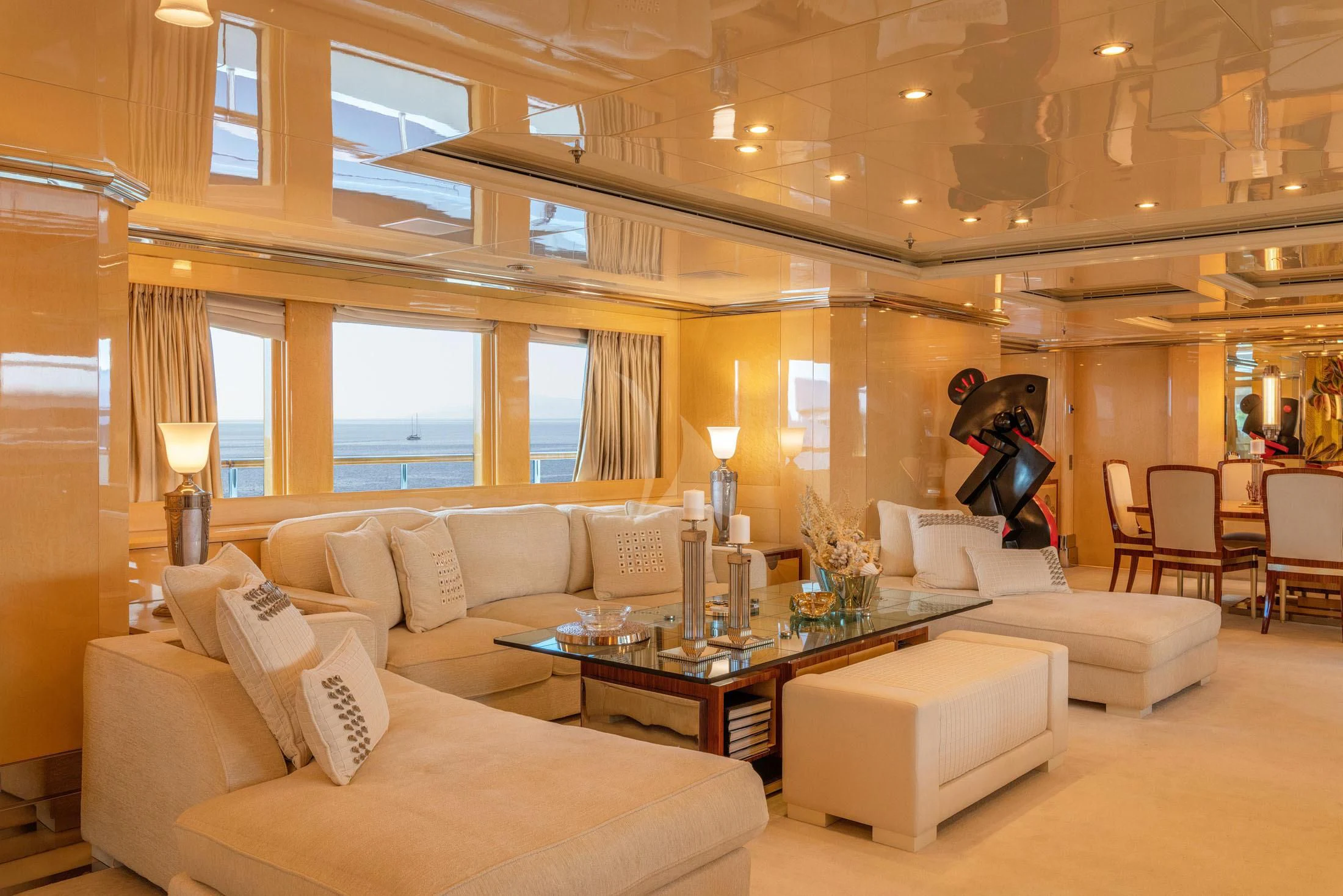 a living room with a large window aboard SUNDAY Yacht for Charter