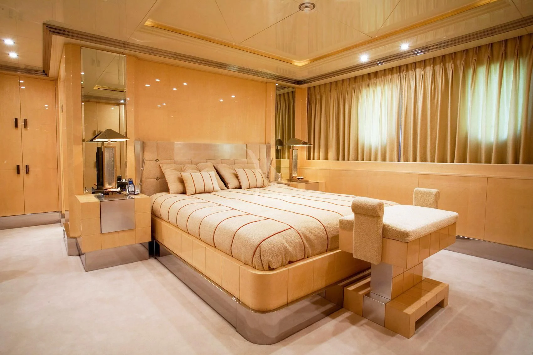 a bed in a room aboard SUNDAY Yacht for Charter