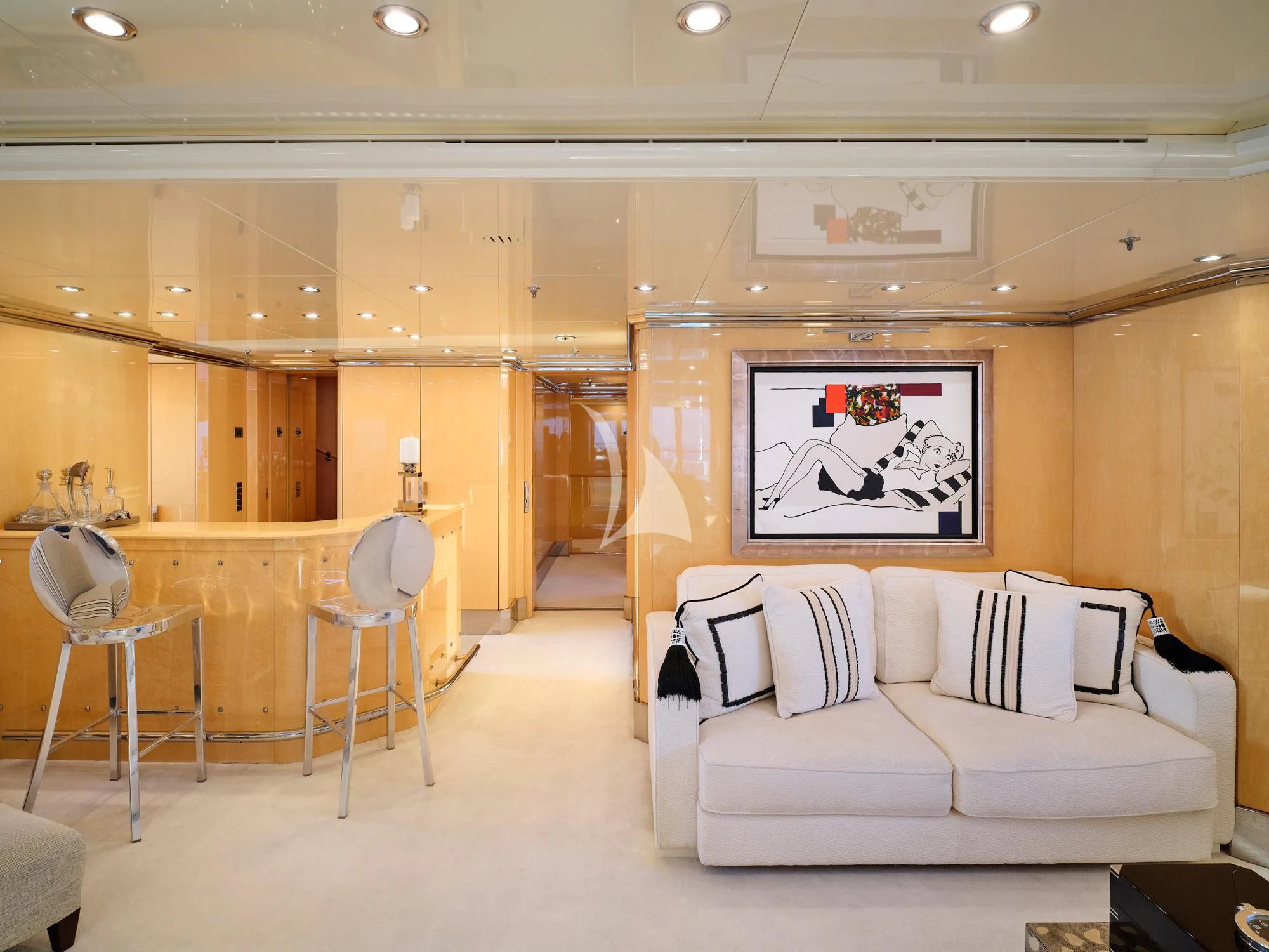 a living room with a couch and a table aboard SUNDAY Yacht for Charter