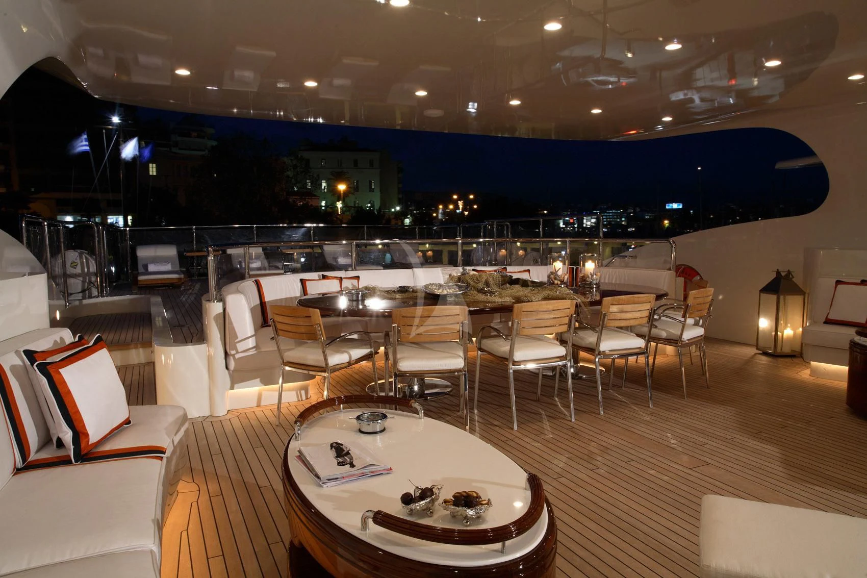 a room with tables and chairs aboard SUNDAY Yacht for Charter