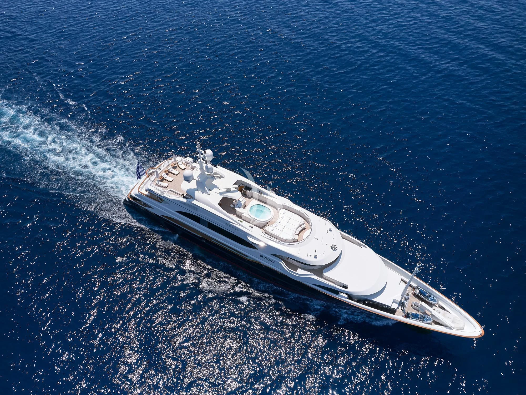 a cell phone on a rock aboard SUNDAY Yacht for Charter