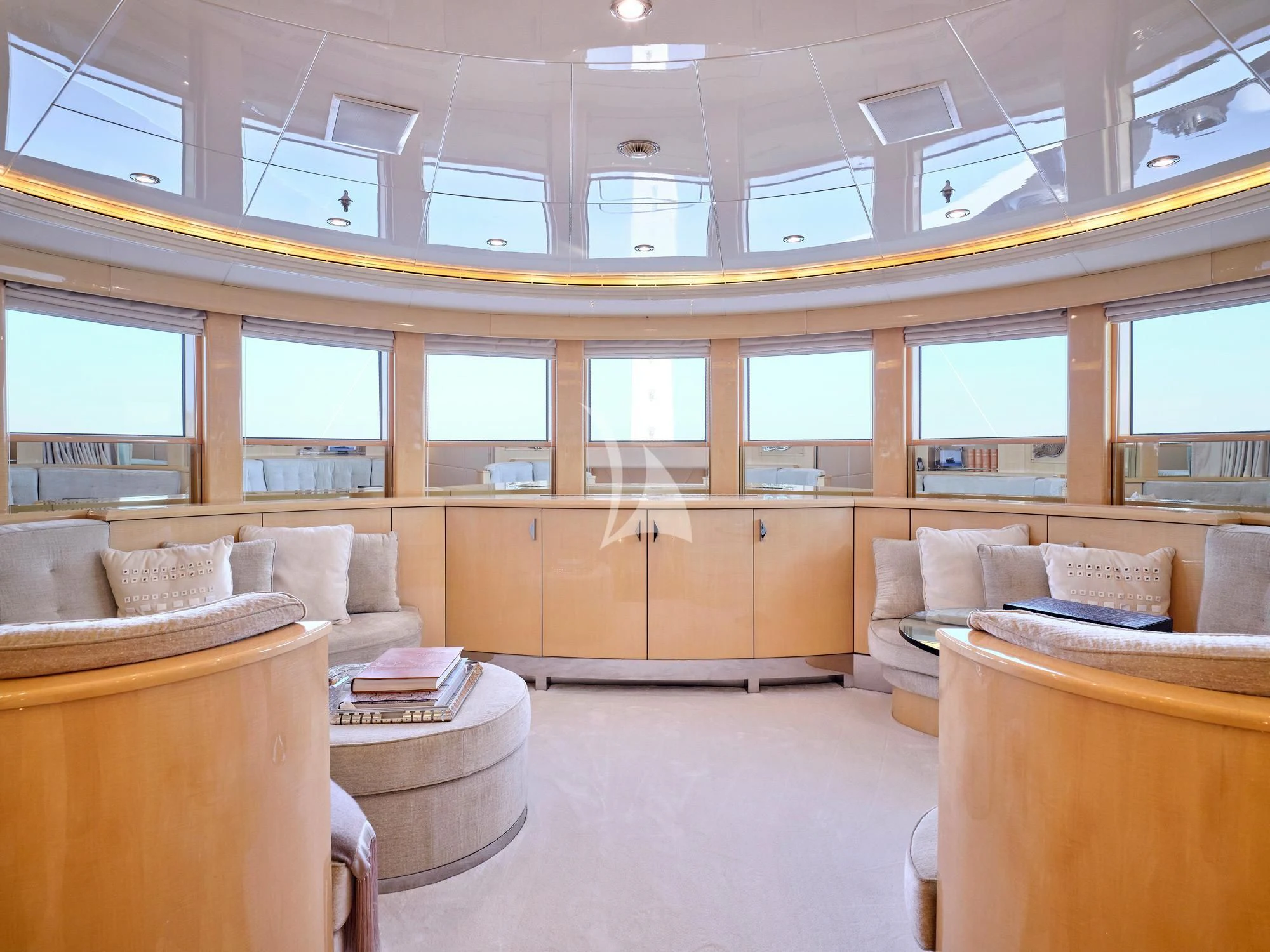 a living room with a couch and a table aboard SUNDAY Yacht for Charter