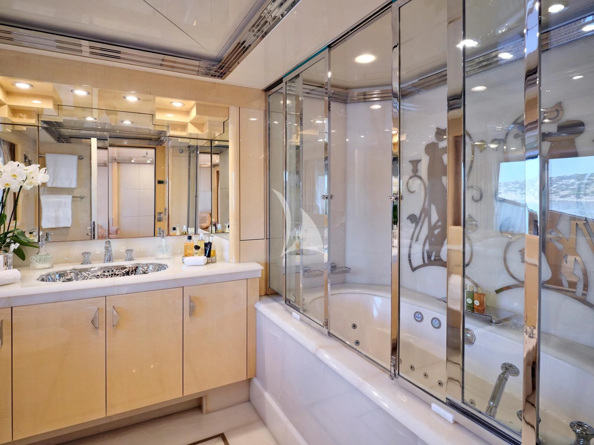 a bathroom with a glass shower aboard SUNDAY Yacht for Charter