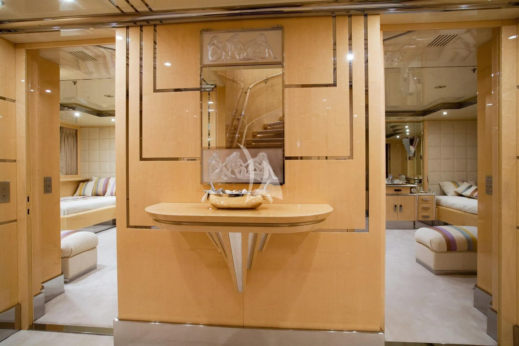 a room with a table and a mirror aboard SUNDAY Yacht for Charter