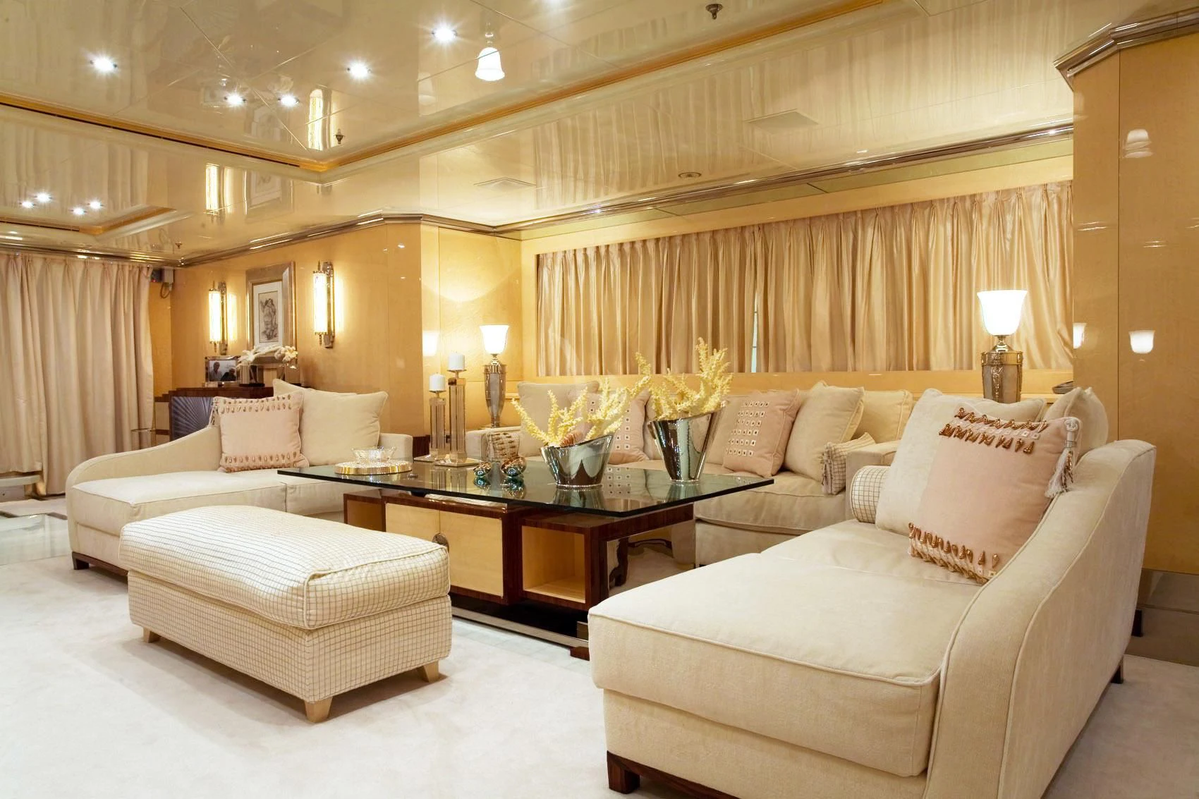 a living room with a couch and a table aboard SUNDAY Yacht for Charter