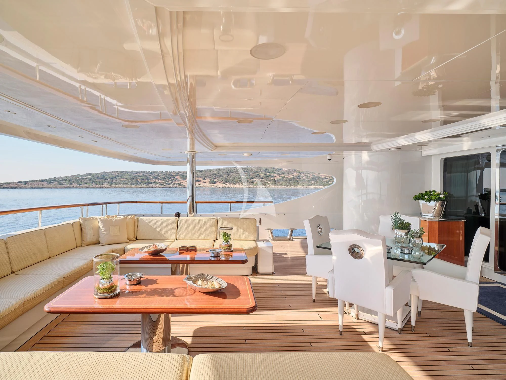 a room with a table and chairs aboard SUNDAY Yacht for Charter