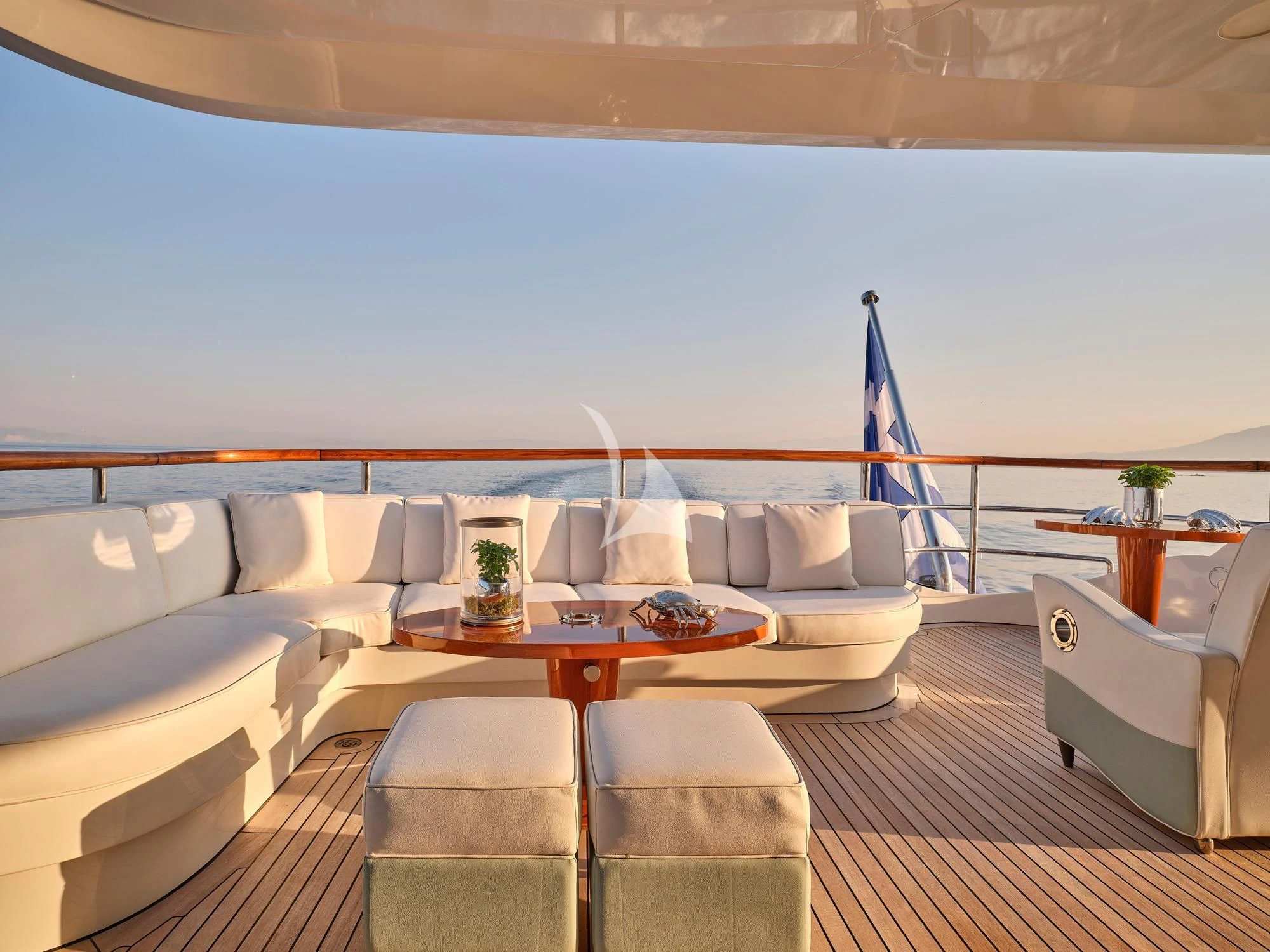 a room with a couch and a table aboard SUNDAY Yacht for Charter