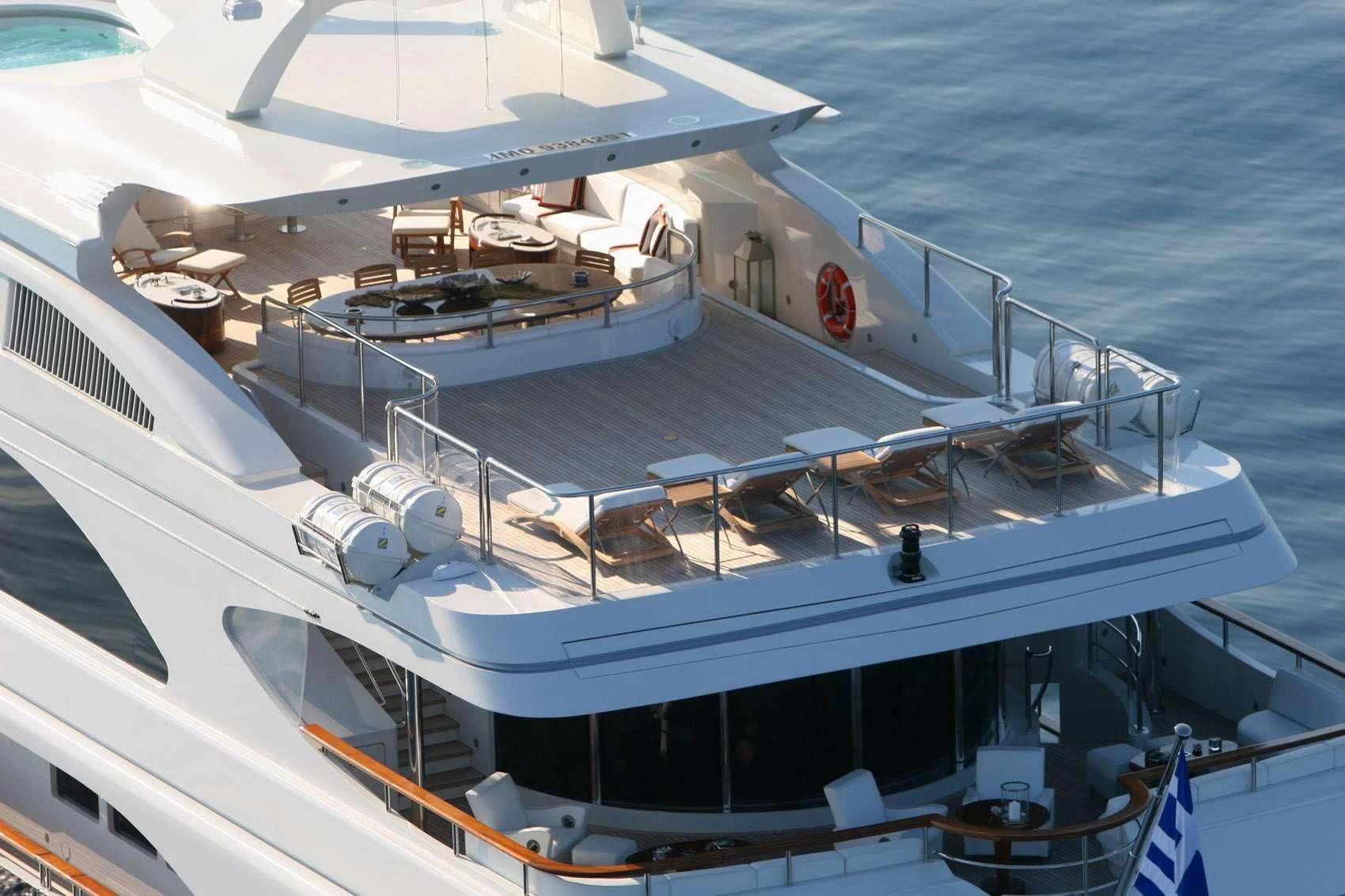 a large ship in the water aboard SUNDAY Yacht for Charter