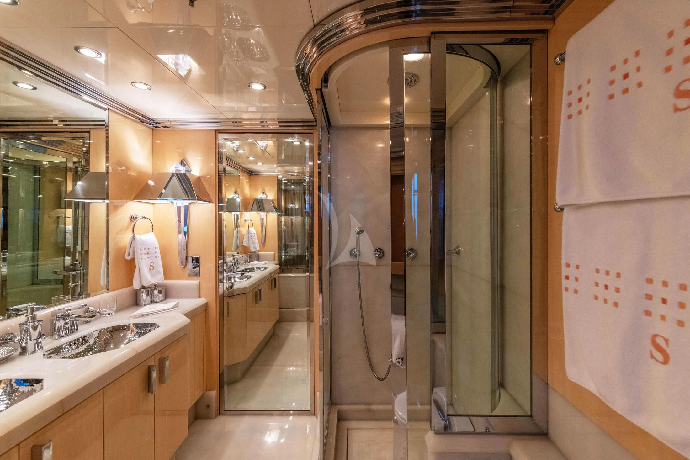 a bathroom with a large mirror aboard SUNDAY Yacht for Charter