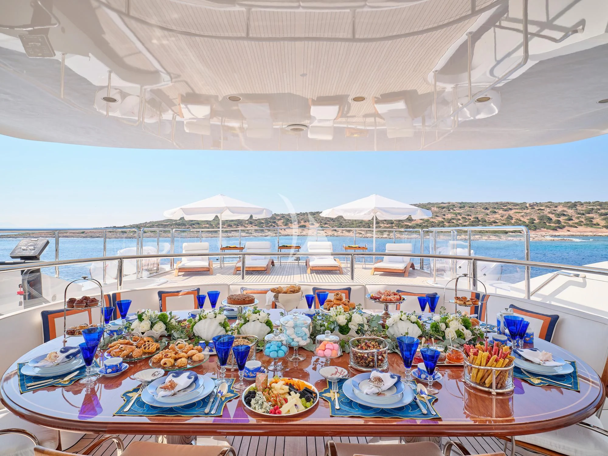 a table with food on it aboard SUNDAY Yacht for Charter