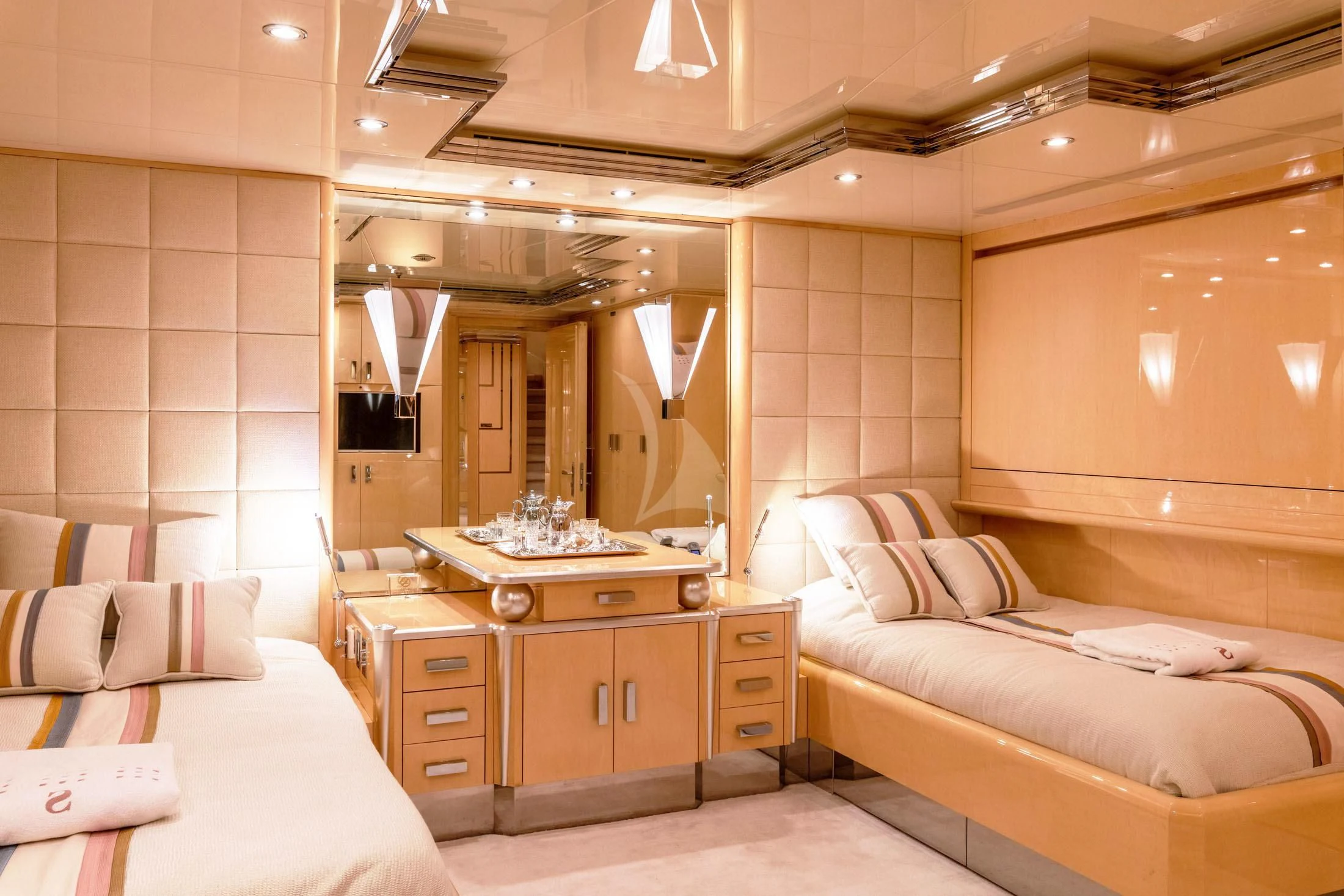 a room with a couple of beds aboard SUNDAY Yacht for Charter