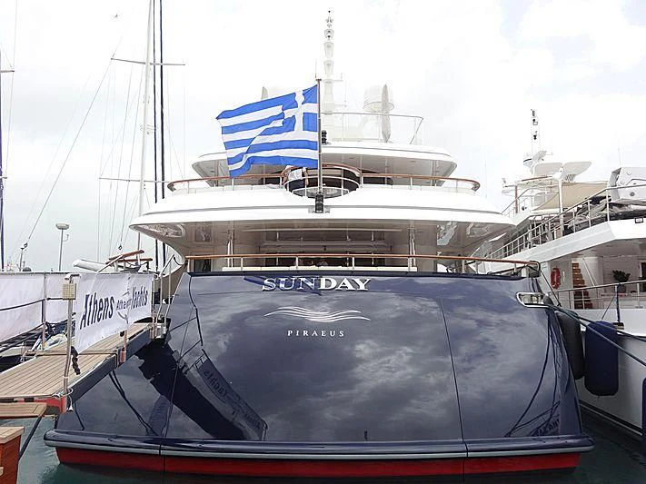 a large ship docked aboard SUNDAY Yacht for Charter