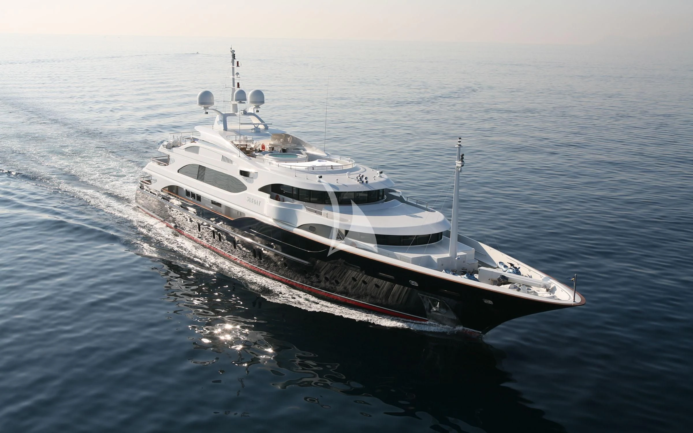 a large white ship aboard SUNDAY Yacht for Charter