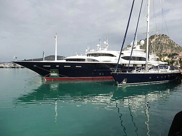 a couple of boats in the water aboard SUNDAY Yacht for Charter