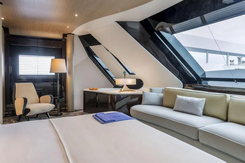 a living room with a large window aboard AURORA Yacht for Sale
