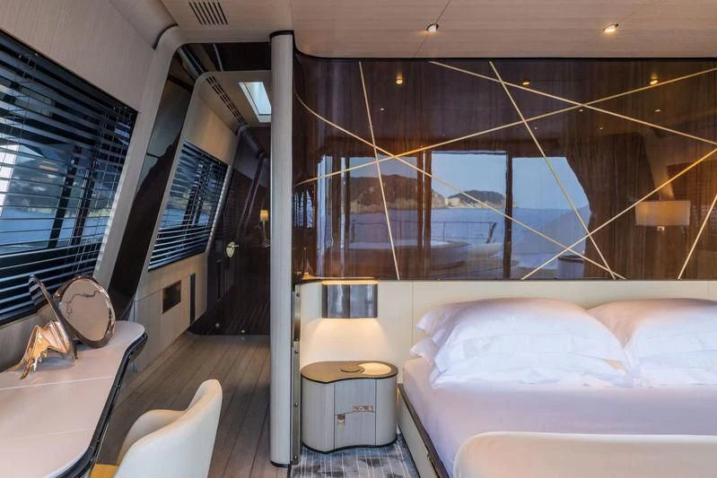 a room with a couch and a window aboard AURORA Yacht for Sale
