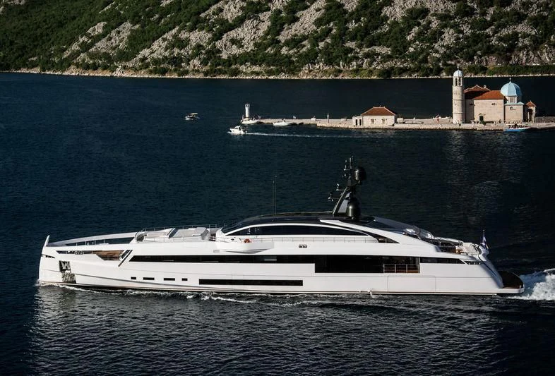 a white boat on the water aboard AURORA Yacht for Sale