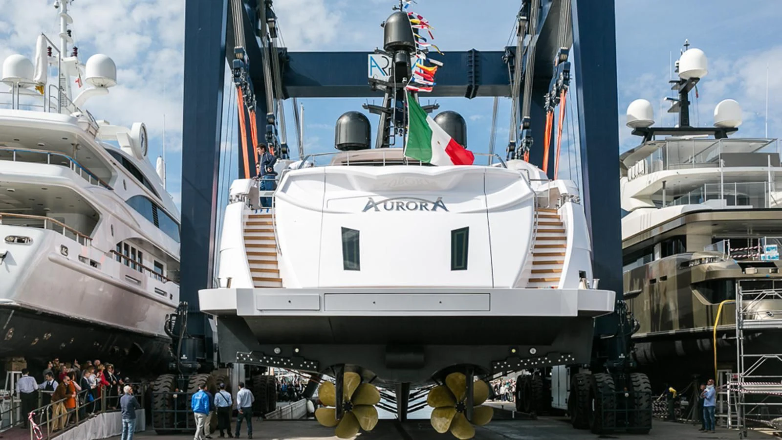 a large white ship docked aboard AURORA Yacht for Sale