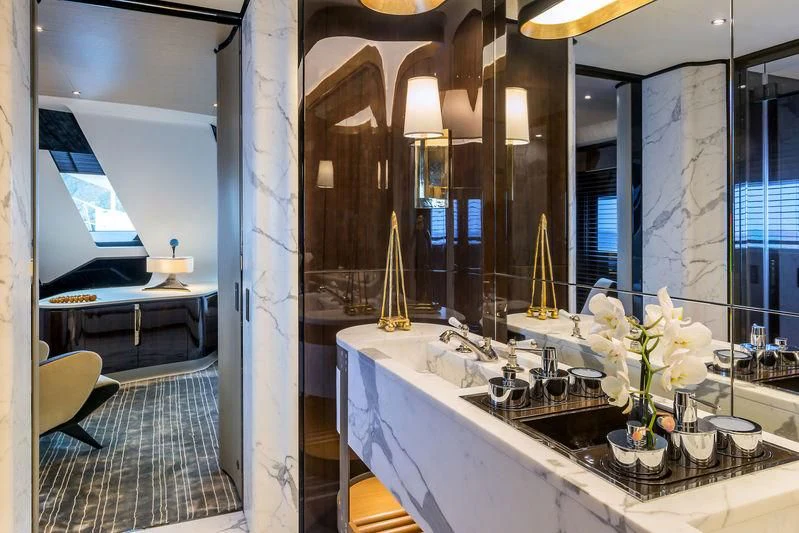 a bathroom with a large tub aboard AURORA Yacht for Sale