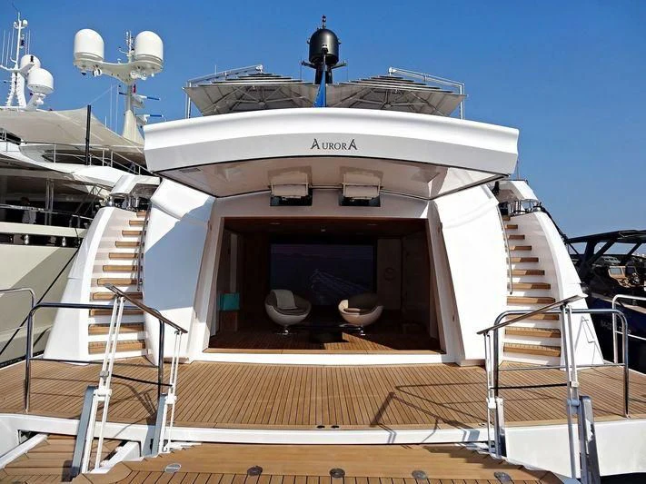 a large white boat with a deck aboard AURORA Yacht for Sale