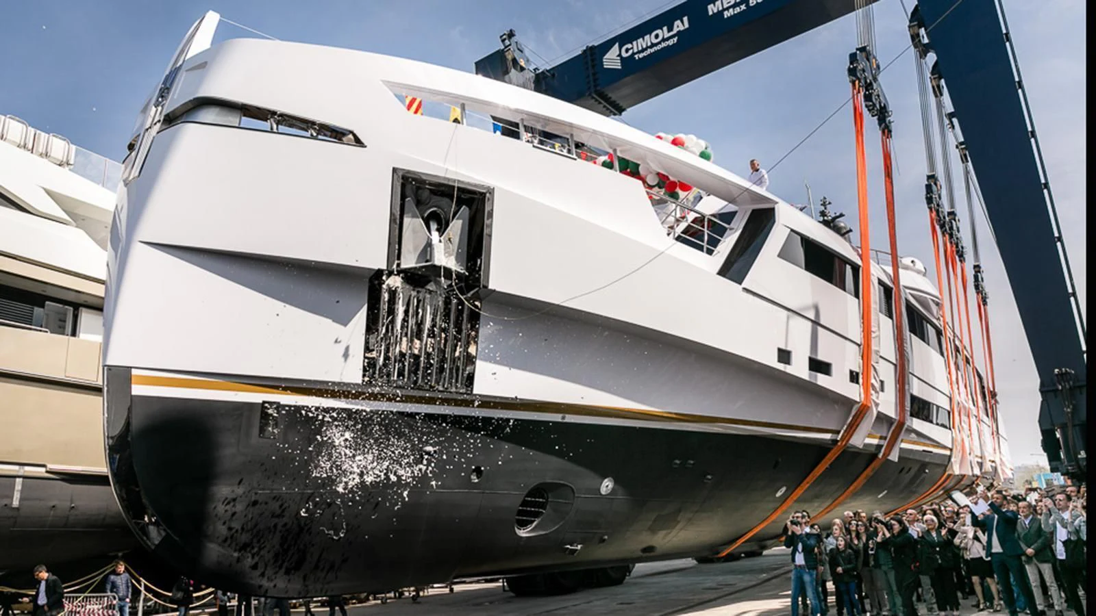 a large silver airplane with people standing around it aboard AURORA Yacht for Sale