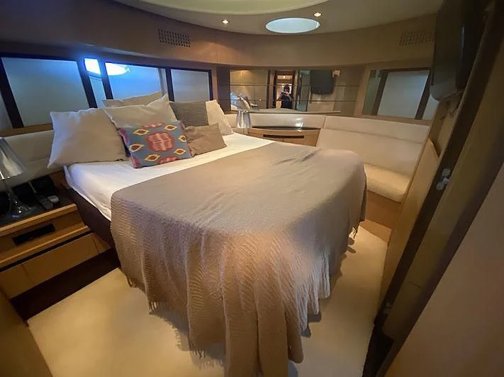 a bed in a room aboard MM Yacht for Sale