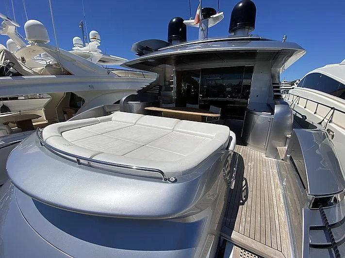 a boat with a large machine aboard MM Yacht for Sale