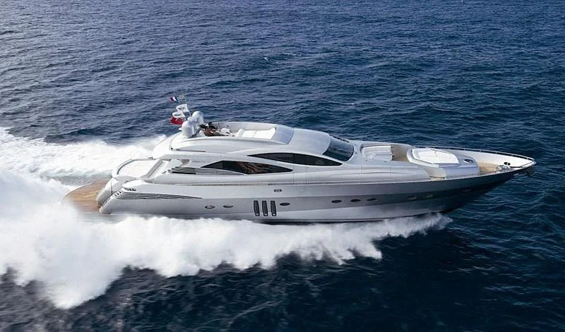 a white boat on the water aboard MM Yacht for Sale