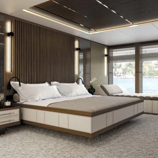 a large bed in a room aboard HORIZON II Yacht for Sale