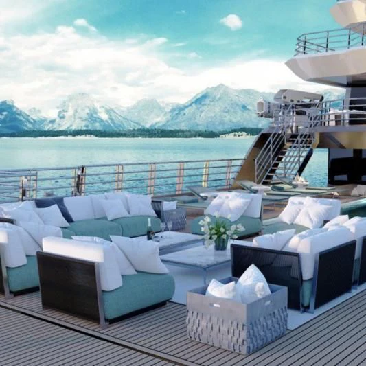 a deck with a view of a mountain and water aboard HORIZON II Yacht for Sale