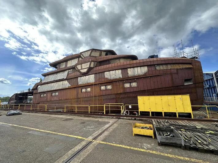 a large building with a yellow container aboard HORIZON II Yacht for Sale